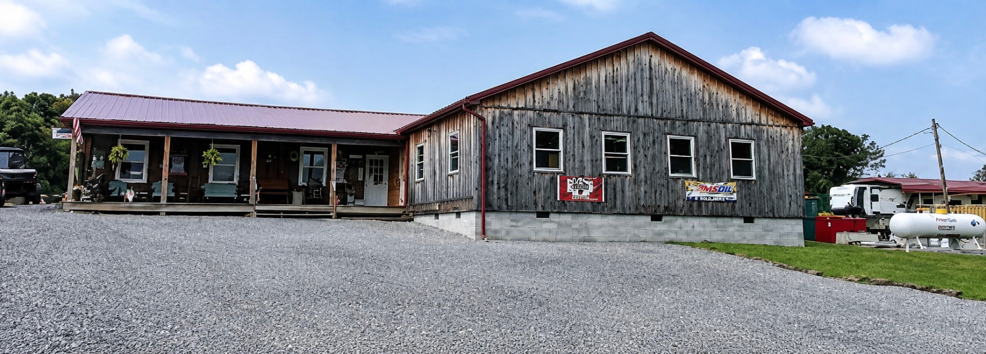 Exterior of the Lost Acres camp store and eatery with its covered porch