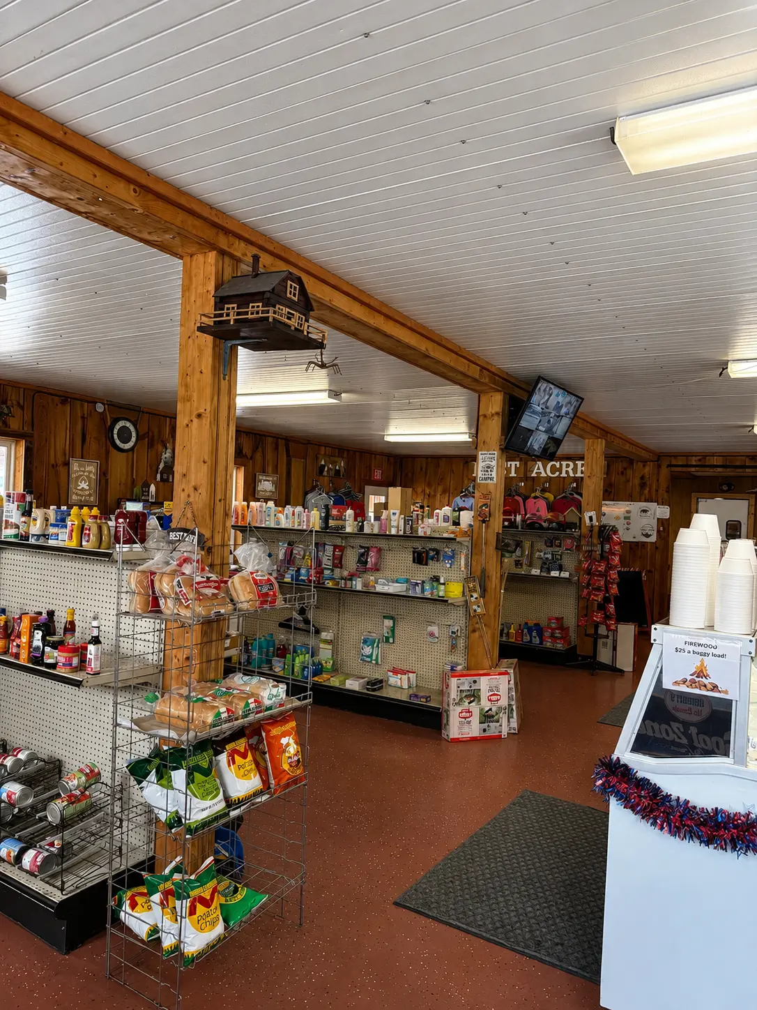Shelves of snacks, bread and basic necessities inside the Lost Acres store